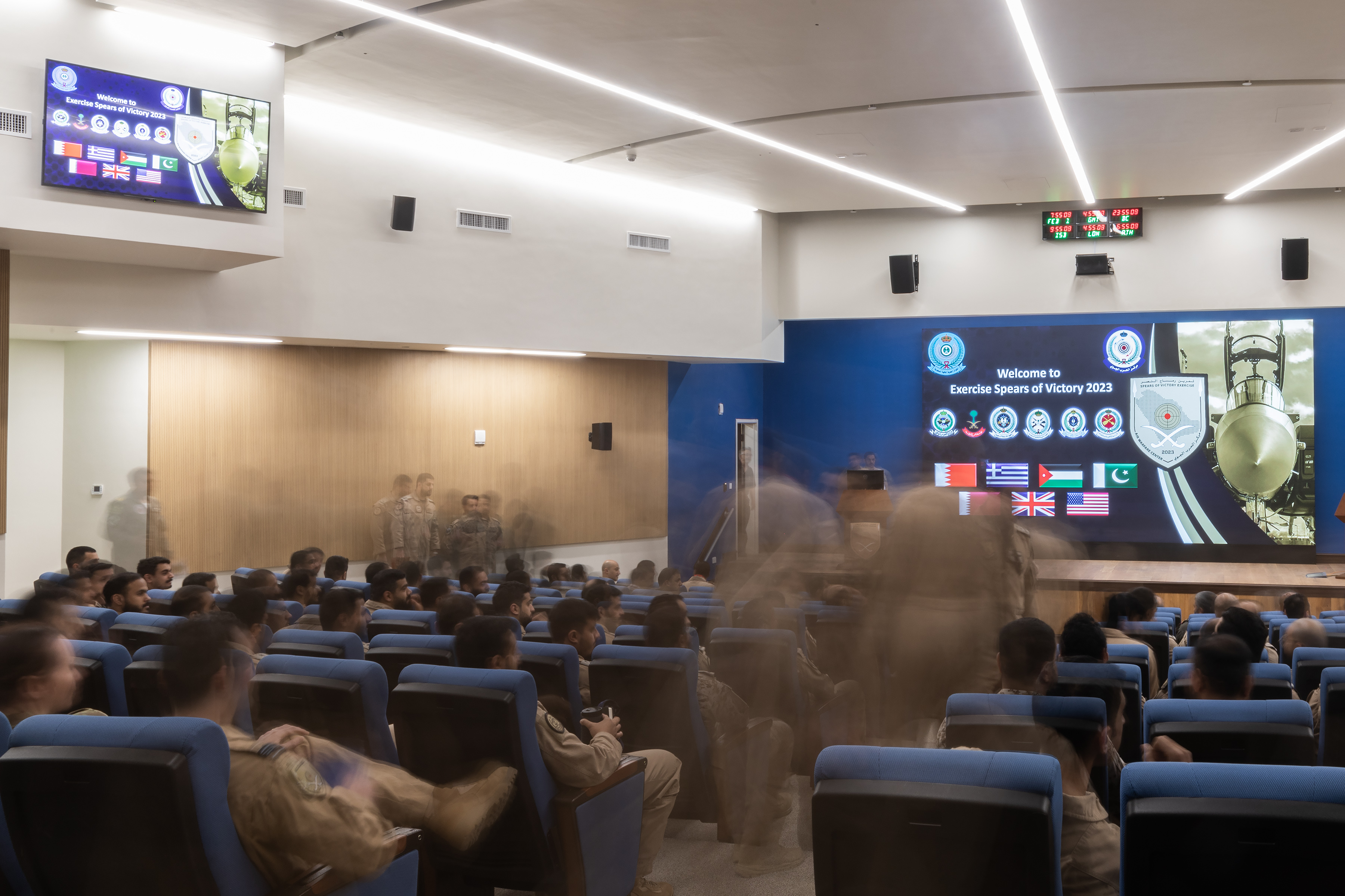 Image shows blurred RAF Aviators in a presentation room.